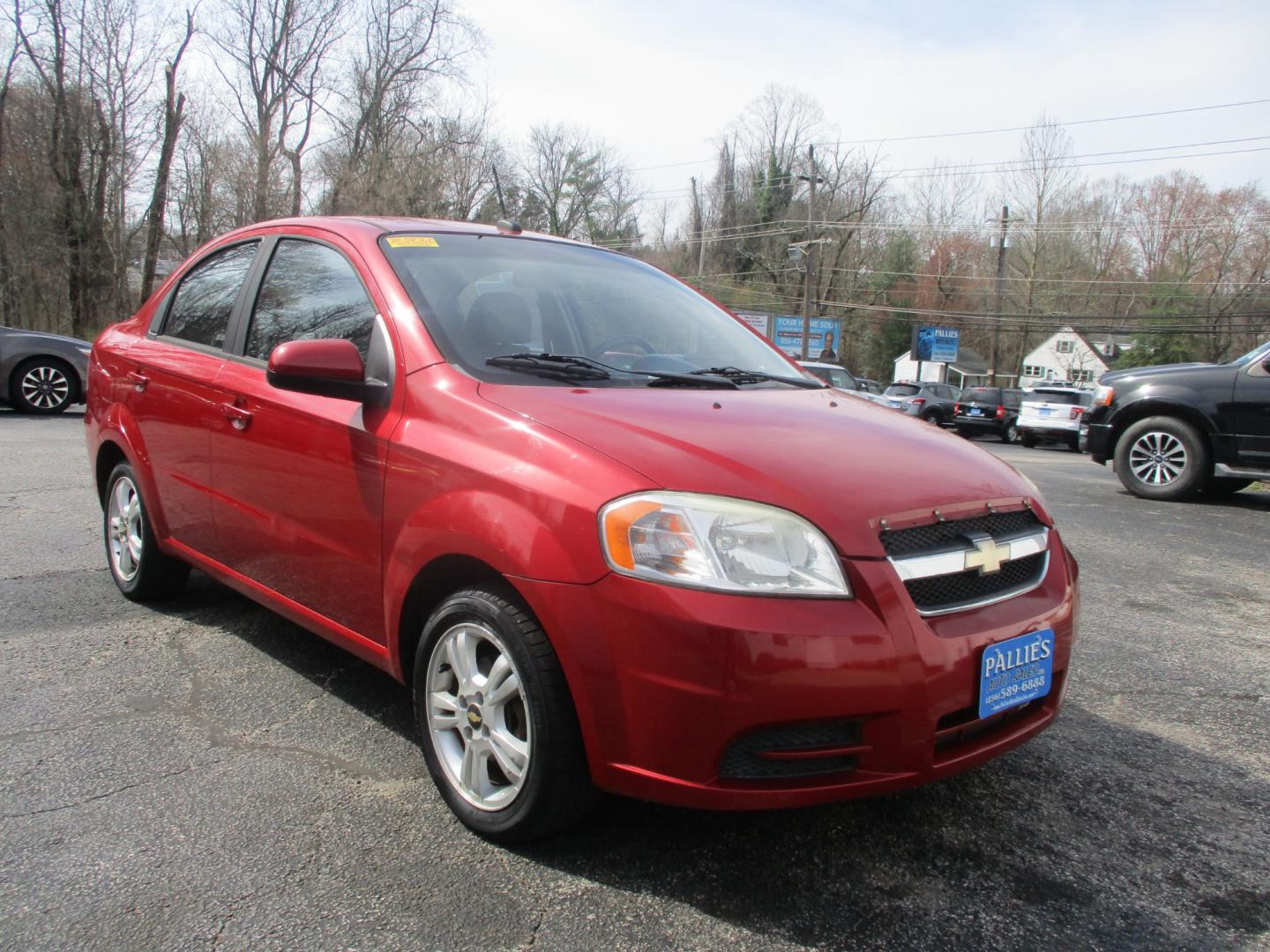 2011 RED Chevrolet Aveo (KL1TD5DE6BB) with an 1.6L L4 DOHC 16V engine, AUTOMATIC transmission, located at 540a Delsea Drive, Sewell, NJ, 08080, (856) 589-6888, 39.752560, -75.111206 - Photo#7